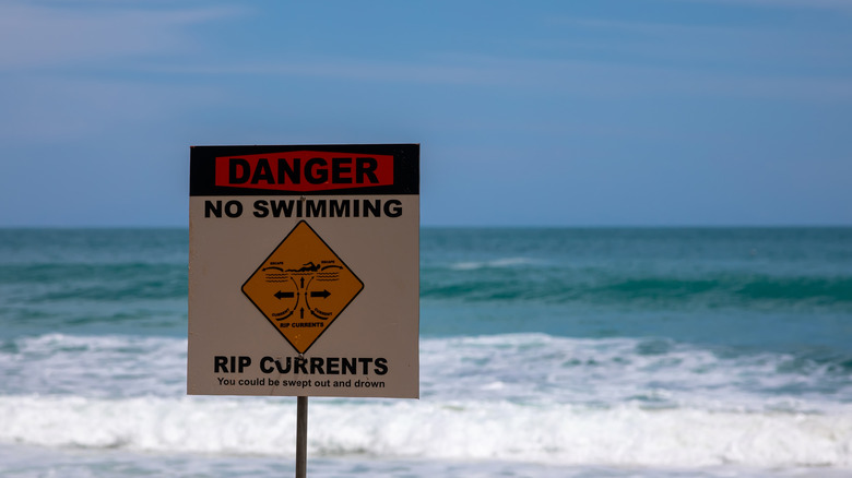 Danger rip currents sign at beach