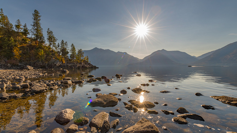 Sun shining high above Kootenay Lake