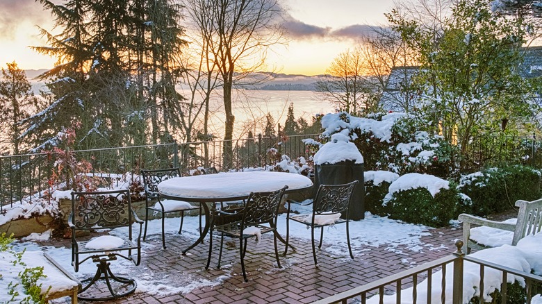 Patio with brick pavers in snow