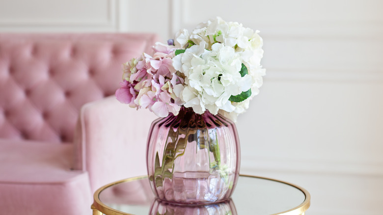 Pink and white hydrangeas in a pink vase