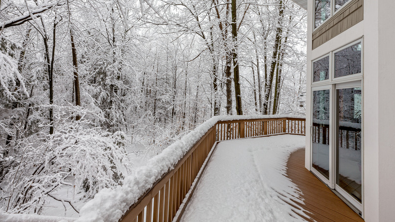 Snow-covered deck in winter