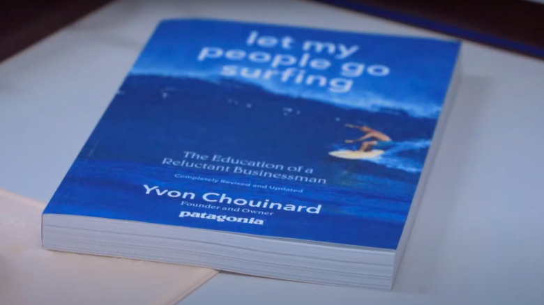 'Let My People Go Surfing' book on table