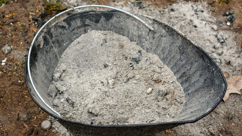 Bin of charcoal ash