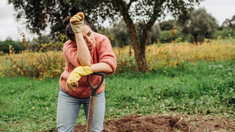 Woman exhausted after gardening