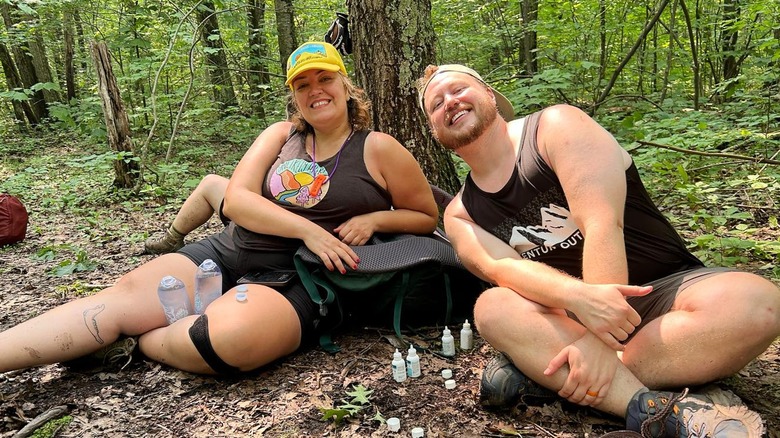 Two unlikely hikers taking a break on their backpacking trip