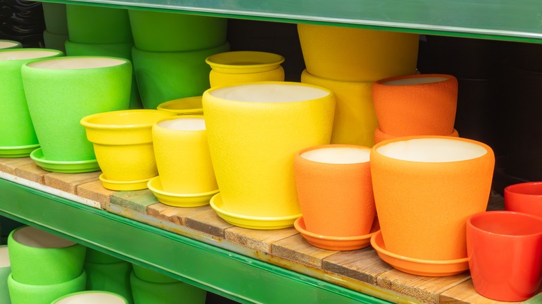 Colorful pots on a shelf