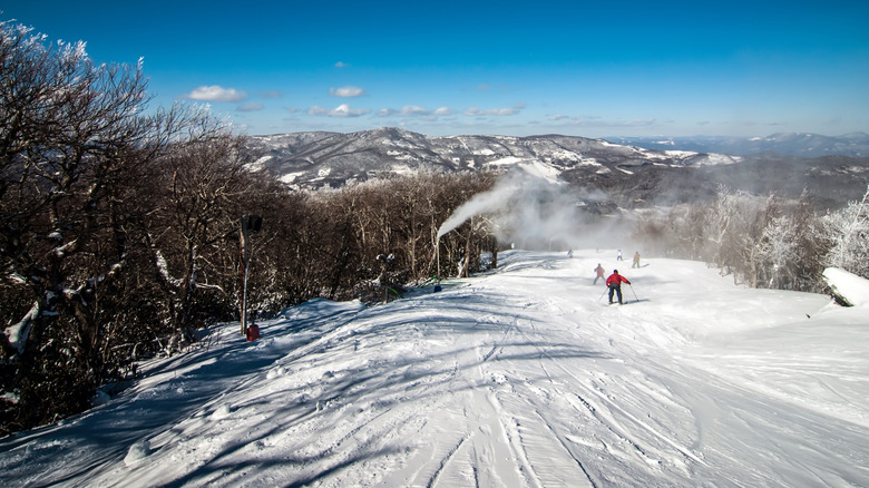 Skiers heading down mountain in North Carolina