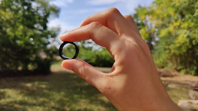 RingConn Gen 2 close-up, held between fingers