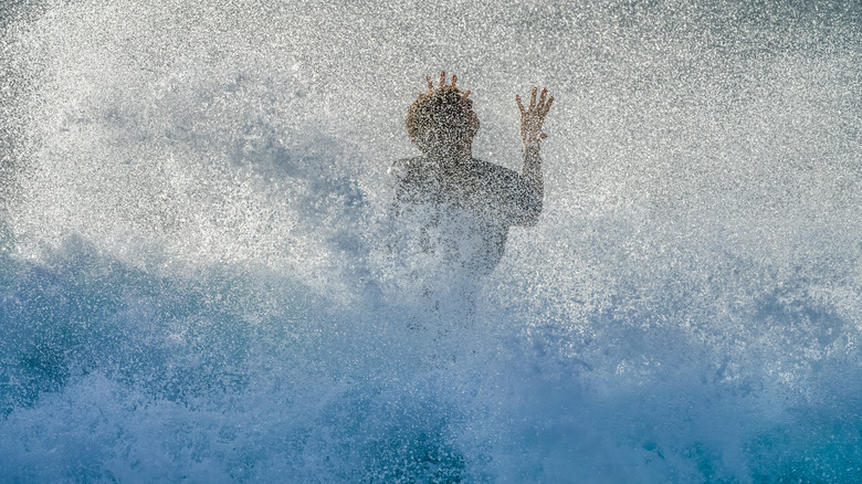 man in breaking wave