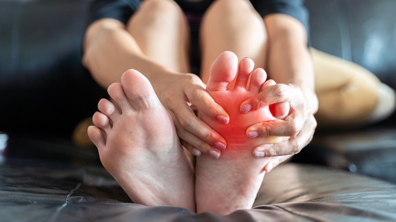 Person massaging their foot