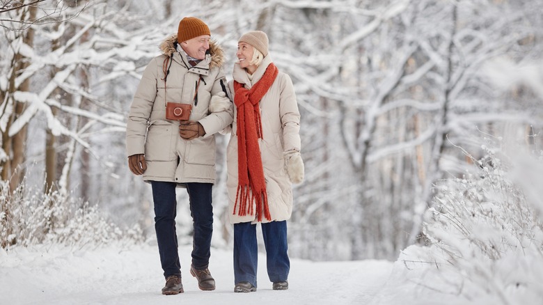  couple dressed warmly walking winter 