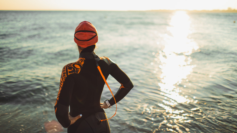 swimmer looking at water