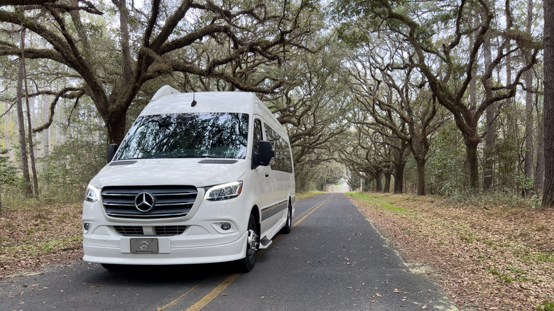 RV van driving through forest in South Carolina