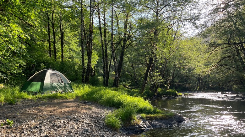 tent on bank of river